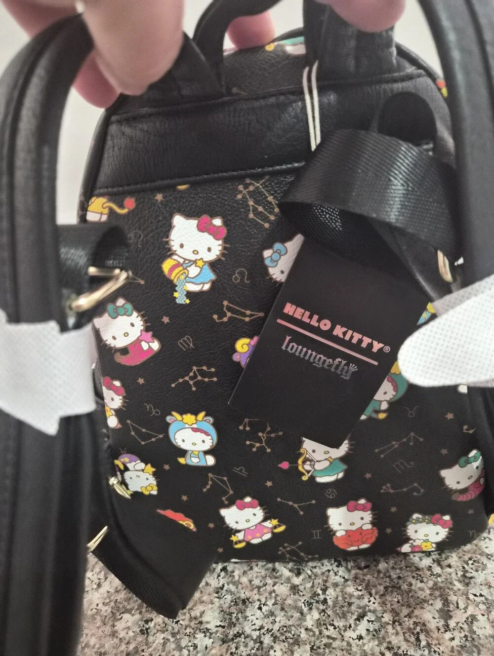Loungefly Hello Kitty All Over Print Mini Backpack.